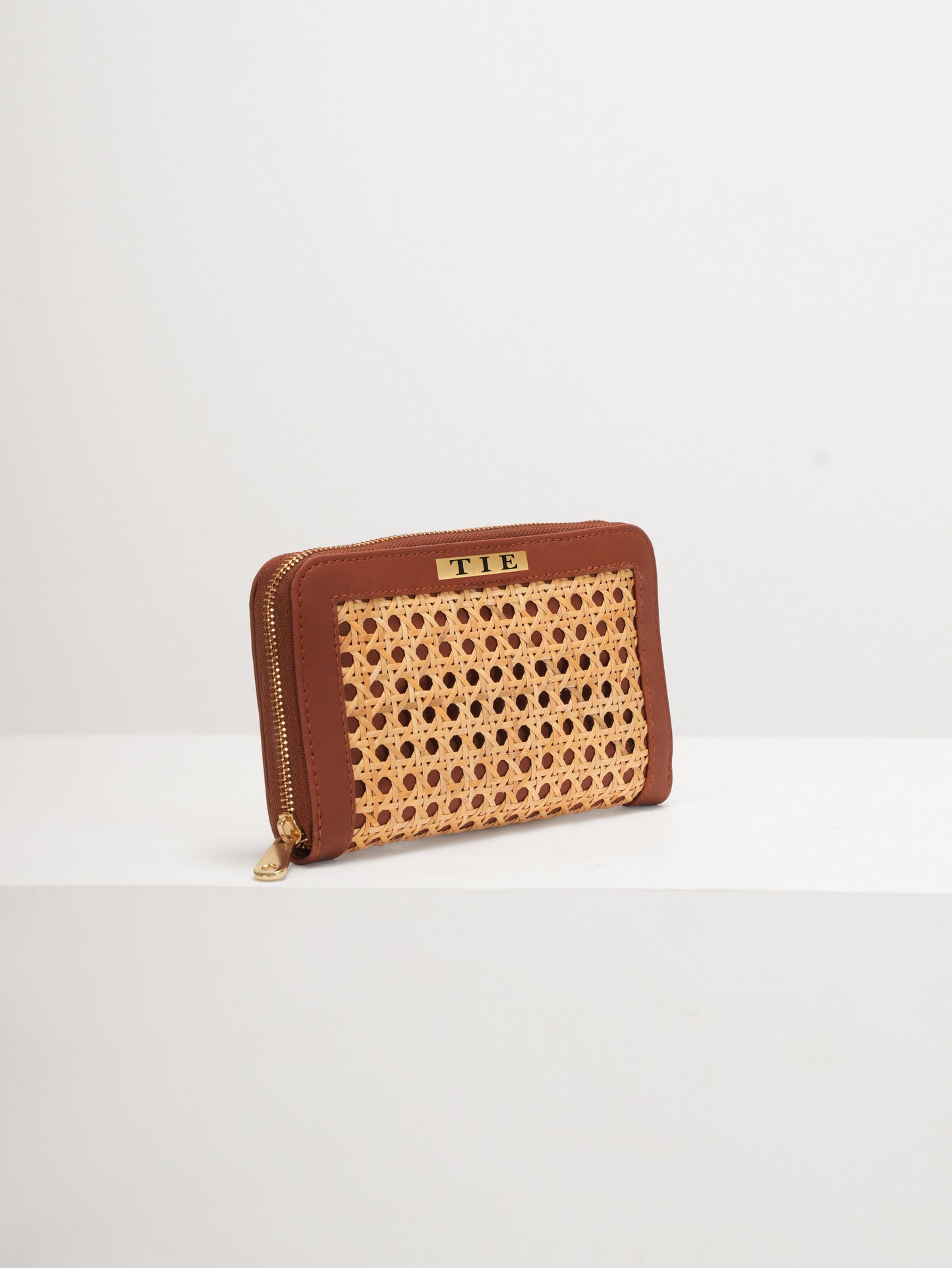 twyla tan cane clutch purse by TIE