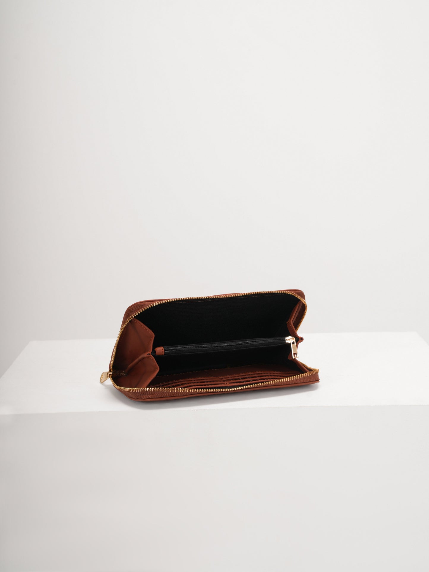 Twyla Tan Cane Clutch