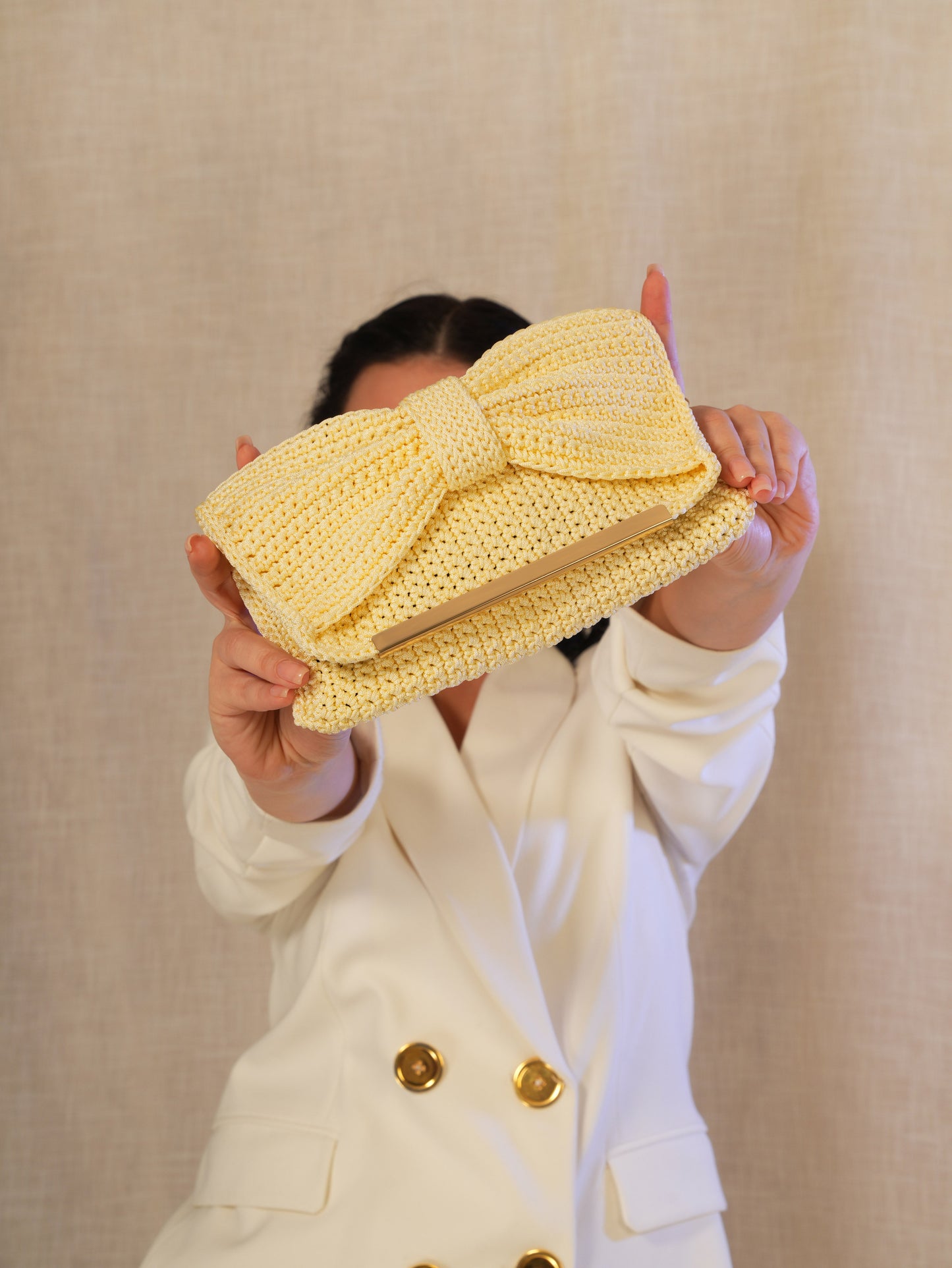 Beige Bow Clutch