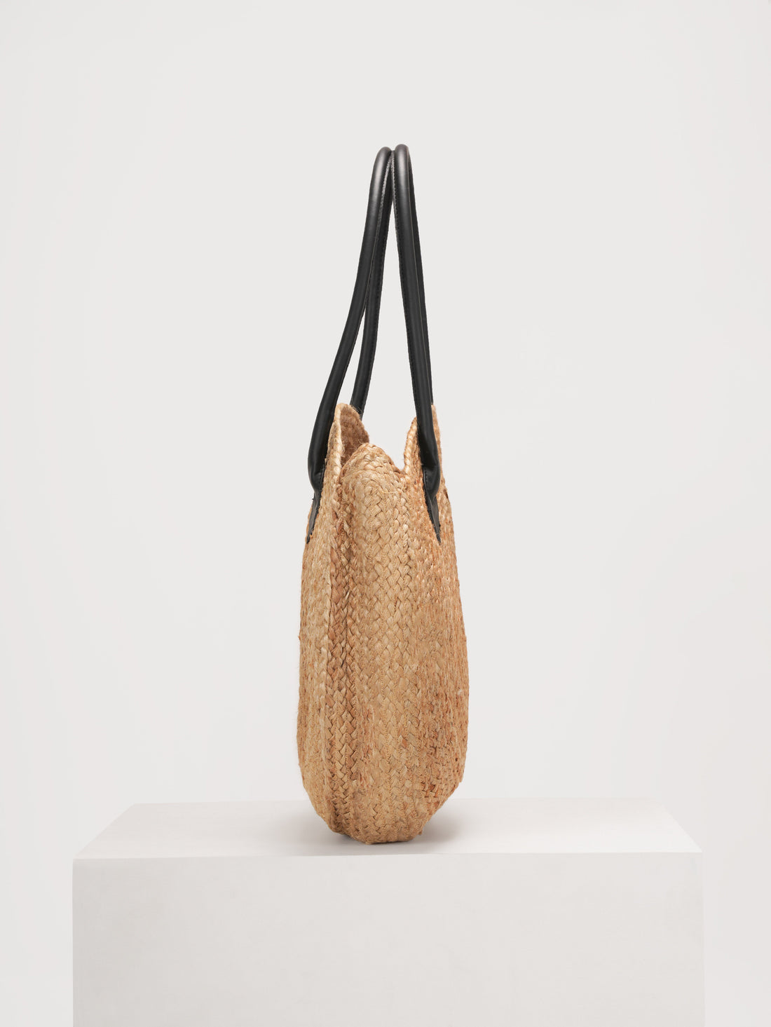 Woven halo jute tote handbag with black handles