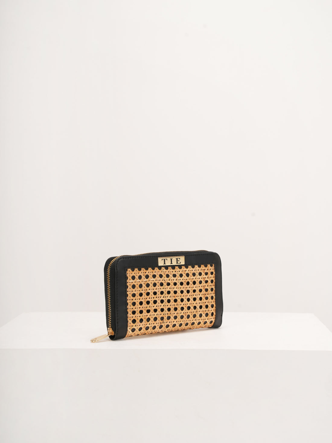 Twyla Tan Cane Clutch | variant: Black